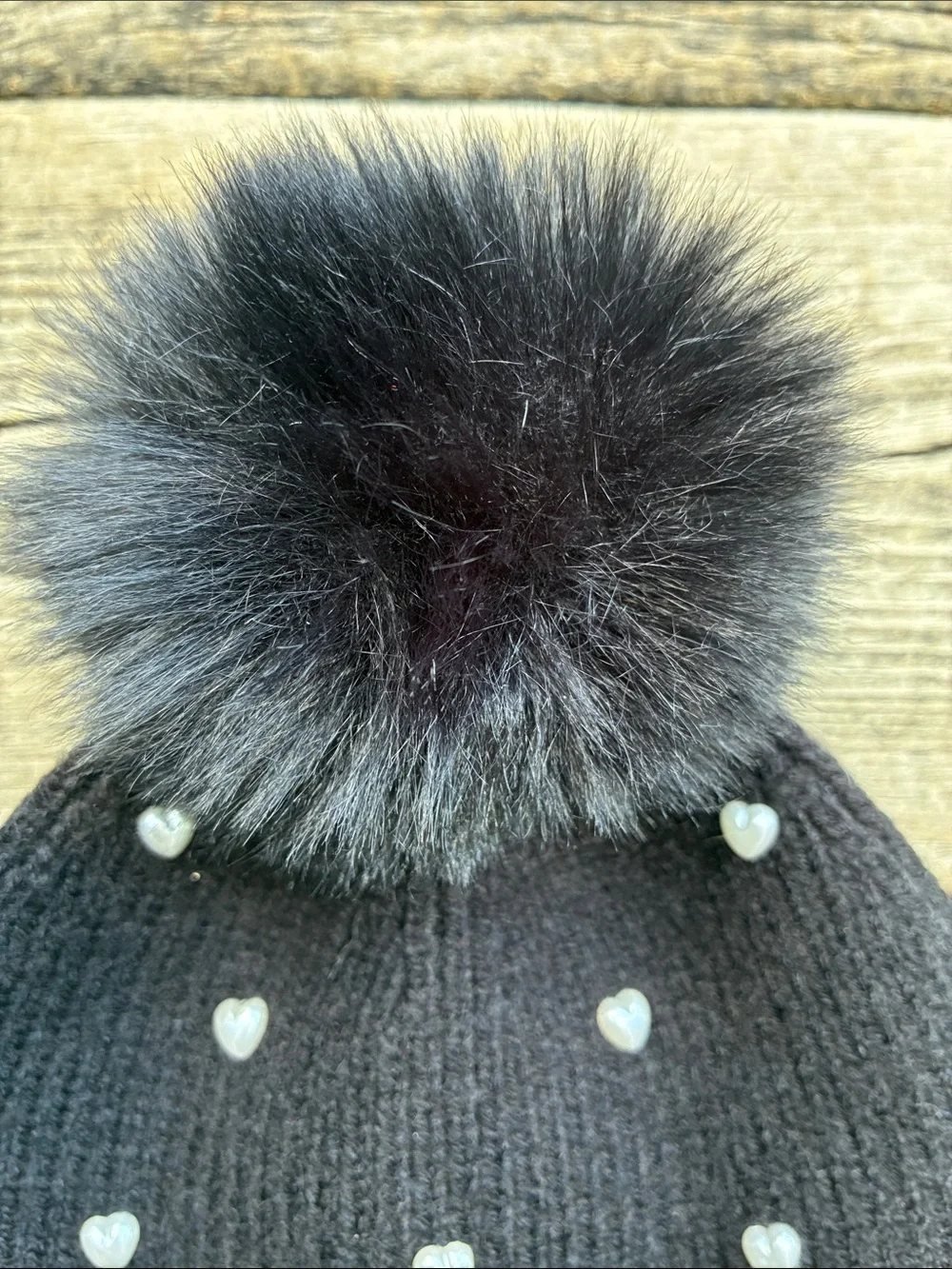 Madden Girl Black Pom-Pom Beanie with Heart Studs